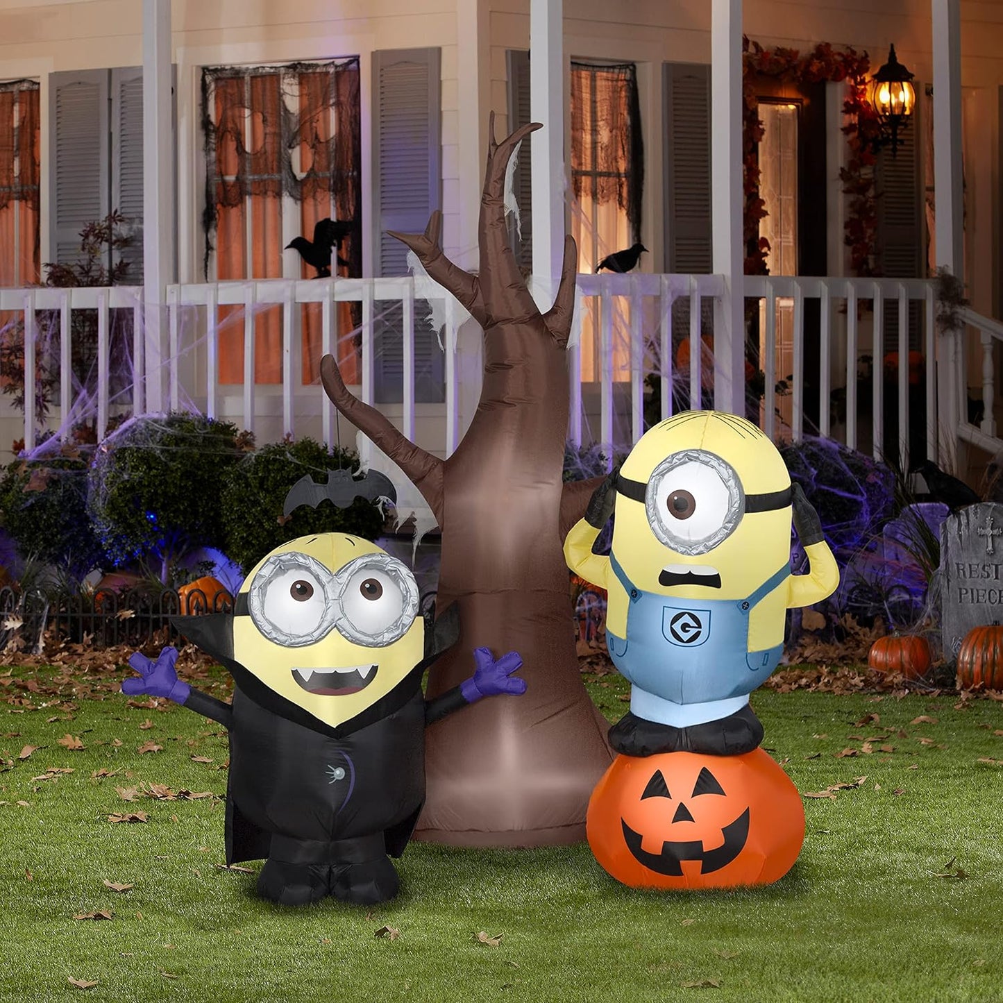 Air blowing minions with tree and pumpkin scene